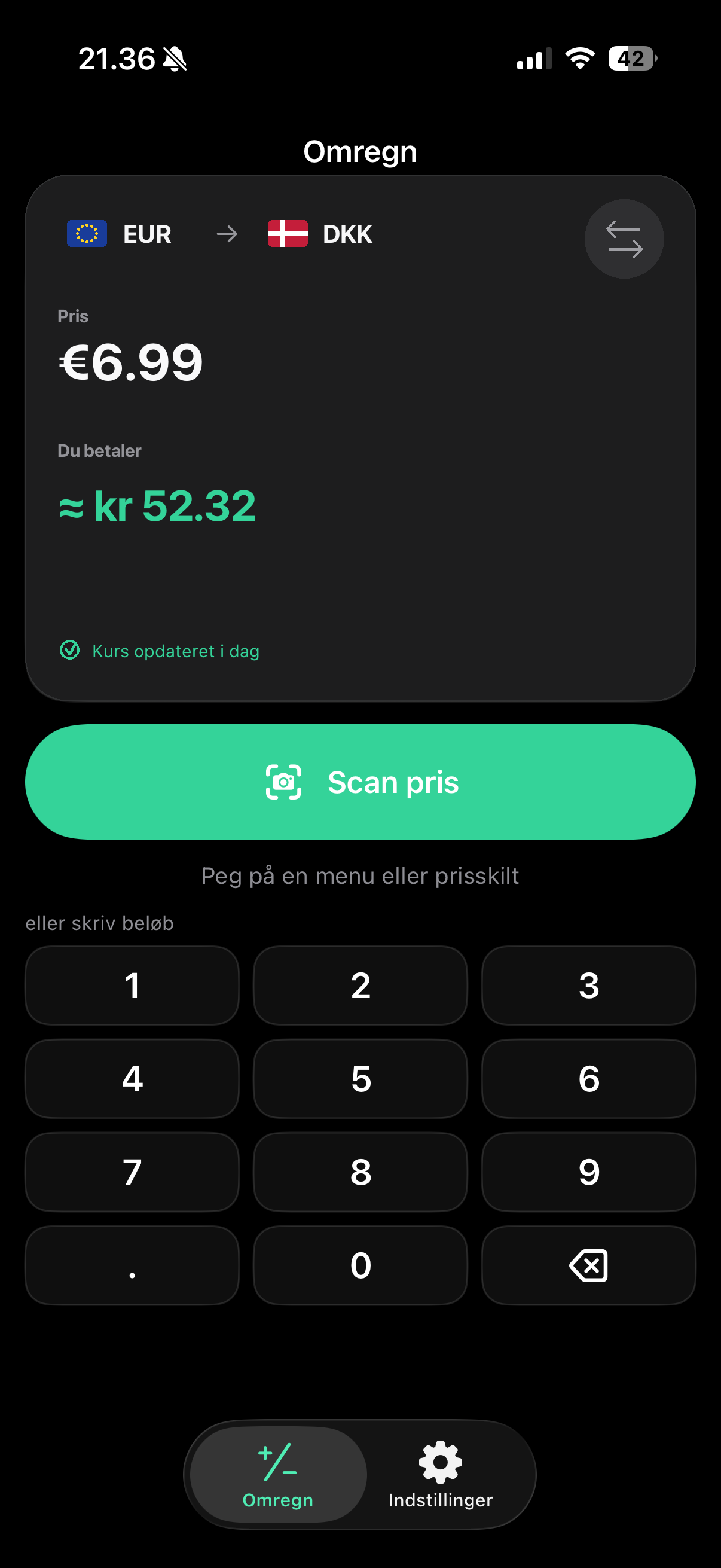 Omregningsresultat i Currency Converter Lens med datoen for den gemte valutakurs